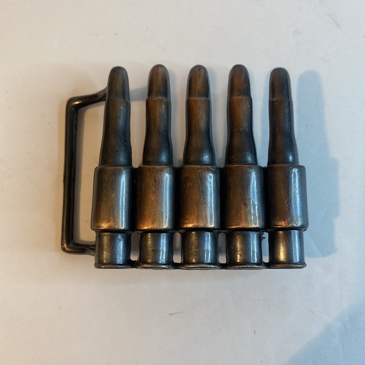 Metal bullet belt buckle copper tone gun ammunition design