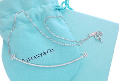 Tiffany & Co 750 (Gold) Large Smile T Diamond Necklace 18