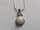 3.42 Ct Ethiopia Natural White Play-of-Color Crystal Pear Opal Silver Pendant — photo 1