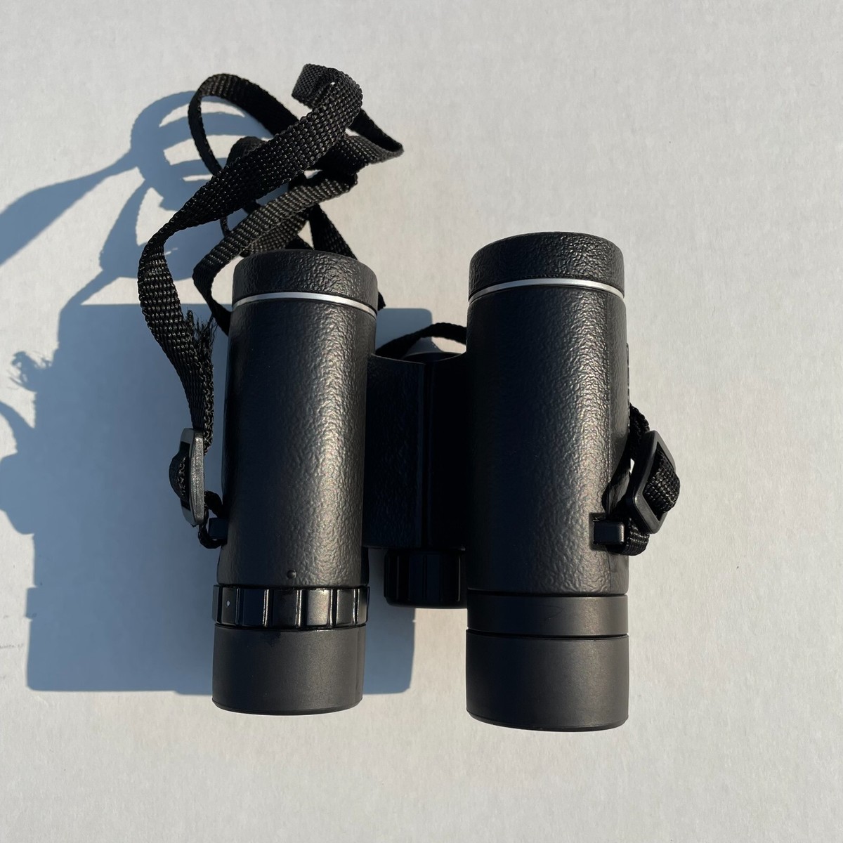 Bushnell binoculars sale 10x25 fov 330ft
