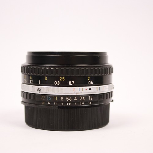 Lente Nikon Serie E 50mm 1:1.8 35MM SLR con tapas - Imagen 10 de 15