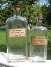 ANTIQUE PAIR OF LABELED CLAREMONT, NEW HAMPSHIRE STRAP SIDED MEDICINE BOTTLES