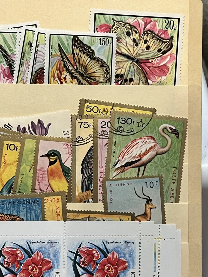 BURUNDI LOT OF STAMPS STUFFED IN A STOCK PAGE FLOWERS, BUTTERFLIES, BIRDS & MORE - Image 4 of 4