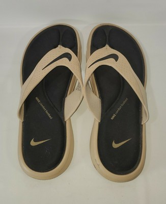 tan nike flip flops