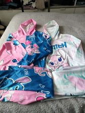 2 Girls Tracksuits New Without Tags Age 11-12 With Stitch On Them Multicoloured