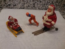 BARCLAY VILLAGE SANTA FIGURES AND SKATER