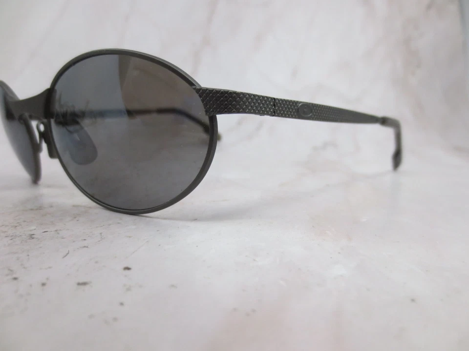 Gafas de sol Foster Grant Ironman para triatlón marco TL1-214 Gunmetal borde completo ovalado Foto 2 de 4