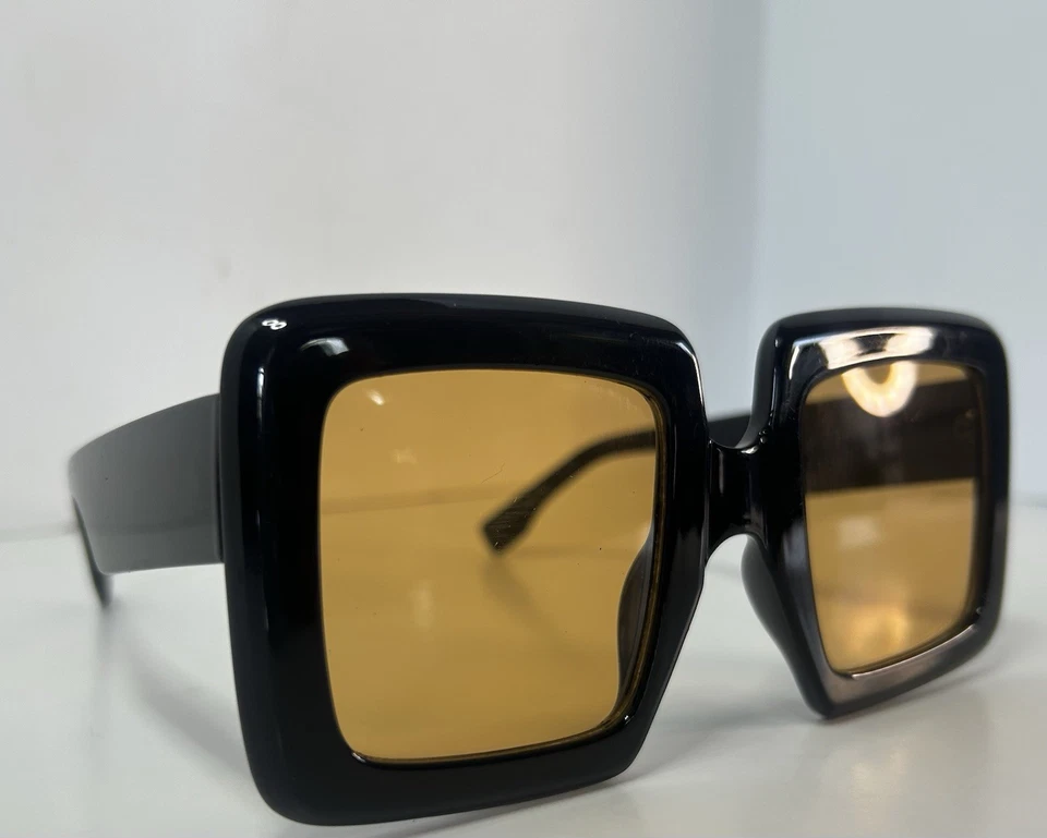 Gafas de sol cuadradas macizas de diseñador para mujer, lentes doradas/naranja, monturas negras Foto 3 de 4