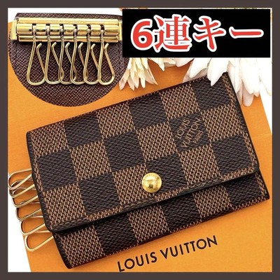 Étui à clés Louis Vuitton ventes exceptionnelles Démure presque inutilisé 4 clés cuir 3,9 x 2,8 pouces