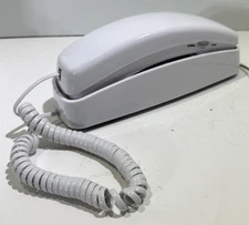 AT&T 210 Basic Trimline Corded Phone, No AC Power Required Wall-Mountable, White