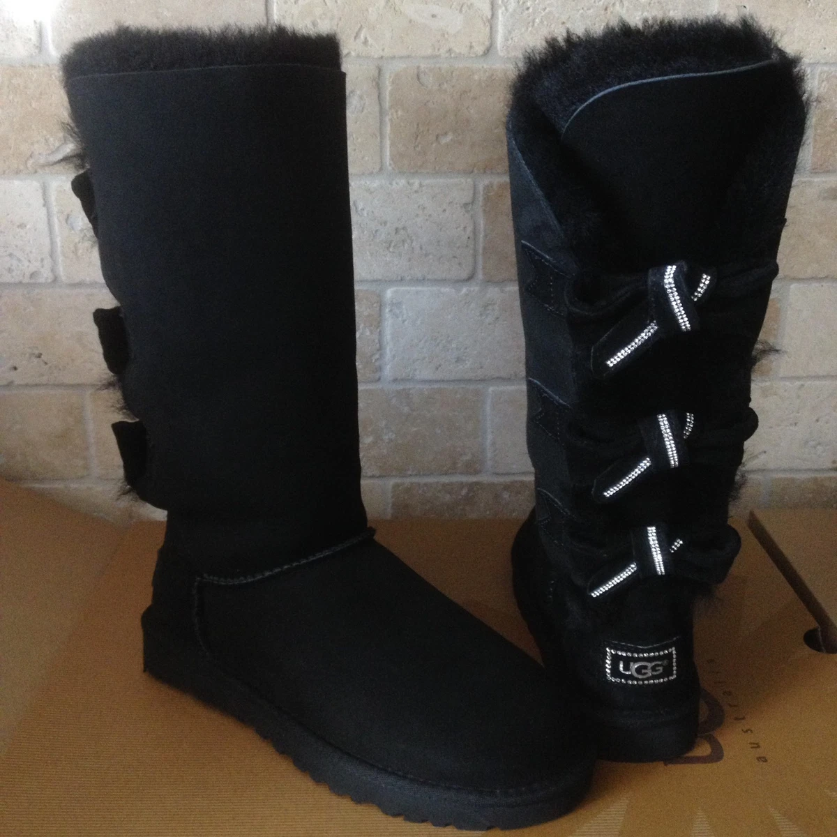 Tall black ugg hotsell boots with bows