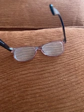 A Collection Of Various Designer Frames And Other Name Brand