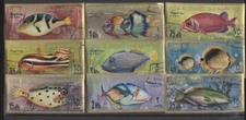 Fish Lightly Cancelled Set of 9 Airmail Stamps Umm Al Qiwain with Gold Borders