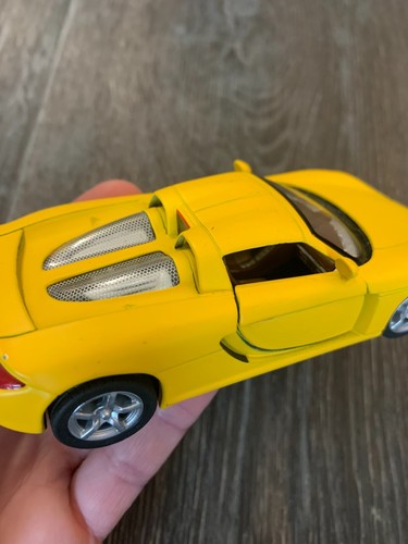 Kinsmart Matte Yellow Porsche Carrera GT Diecast Car 1/36 Scale - Picture 16 of 17
