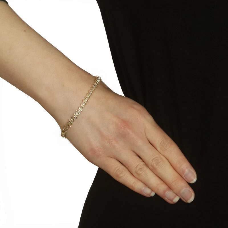 Brazalete de eslabones de diamantes de oro amarillo de 7 1/4" - 10 k redondo brillante tenis de 0,98 ctw Foto 2 de 4