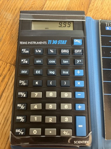 Calculadora científica Texas Instruments TI 30 STAT con estuche y manual
