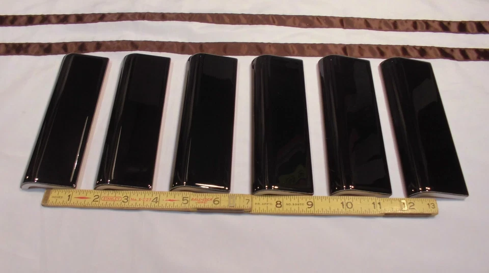 Tapa de barro de azulejo de cerámica negra de 2 x 6 pulgadas con borde de nariz de toro de 2 x 6 pulgadas American Olean paquete de 6 Foto 4 de 4