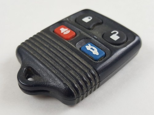 ORIGINAL MERCURY 99-09 OEM KEY LESS ENTRY REMOTE TRANSMITTER ALARM FOB 4-BUTTON - Picture 3 of 12