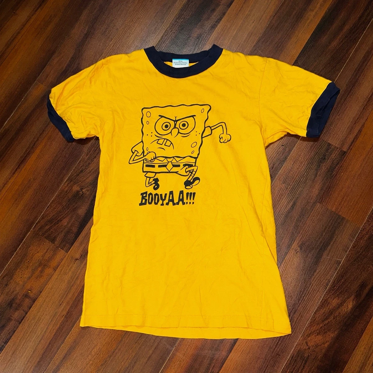 Déguishirt Bob l'Éponge : Déguisement T-shirt Bob l'Éponge blasé Déguishirt Bob l'Éponge : Déguisement T-shirt Bob l'Éponge blasé