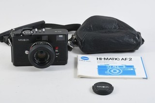 C66D30 Minolta HI matic fotocamera messa a fuoco automatica con obiettivo 38 mm f/2 8 e custodia