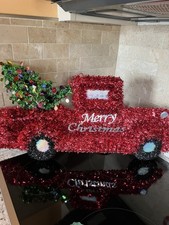 Red truck hanging Christmas decoration. 24  x 10  .  Hanging loop on top.