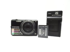 Samsung ST67 14.2 MP Compact Digital Camera with Battery Charger.