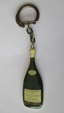 Porte clé, années 60, Bouteille Fine Champagne COGNAC REMY MARTIN