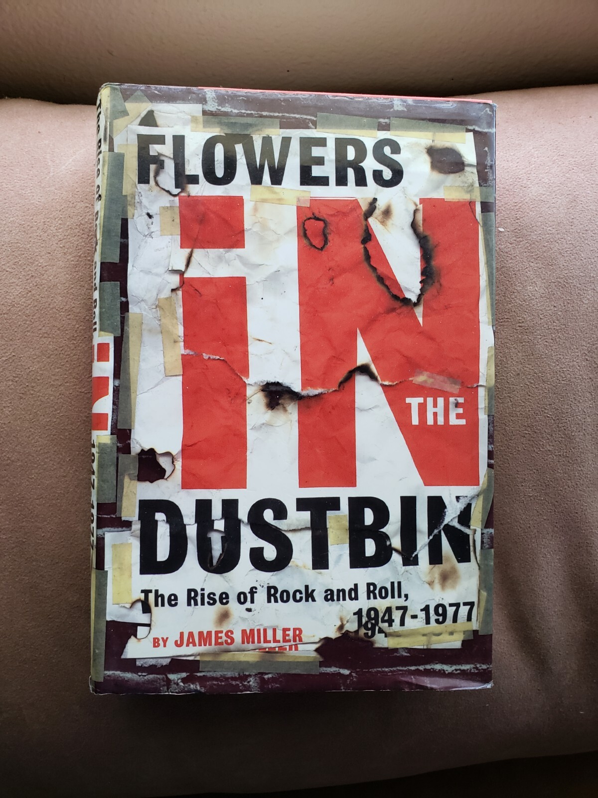 FLOWERS IN THE DUSTBIN by James Miller( Hardcover) 1st ed/1st printing .Preowned