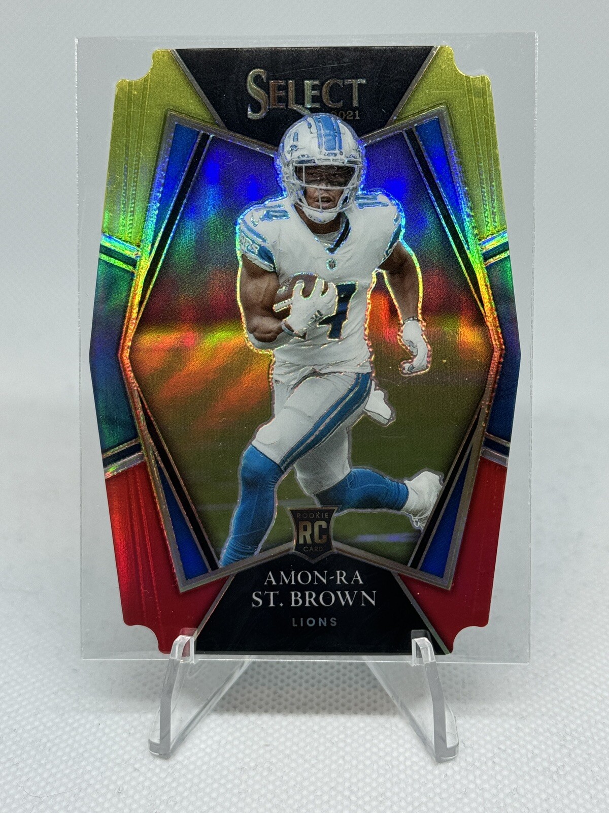 2021 Select Amon-Ra St. Brown Premier Level Red Yellow Prizm Die-Cut #173