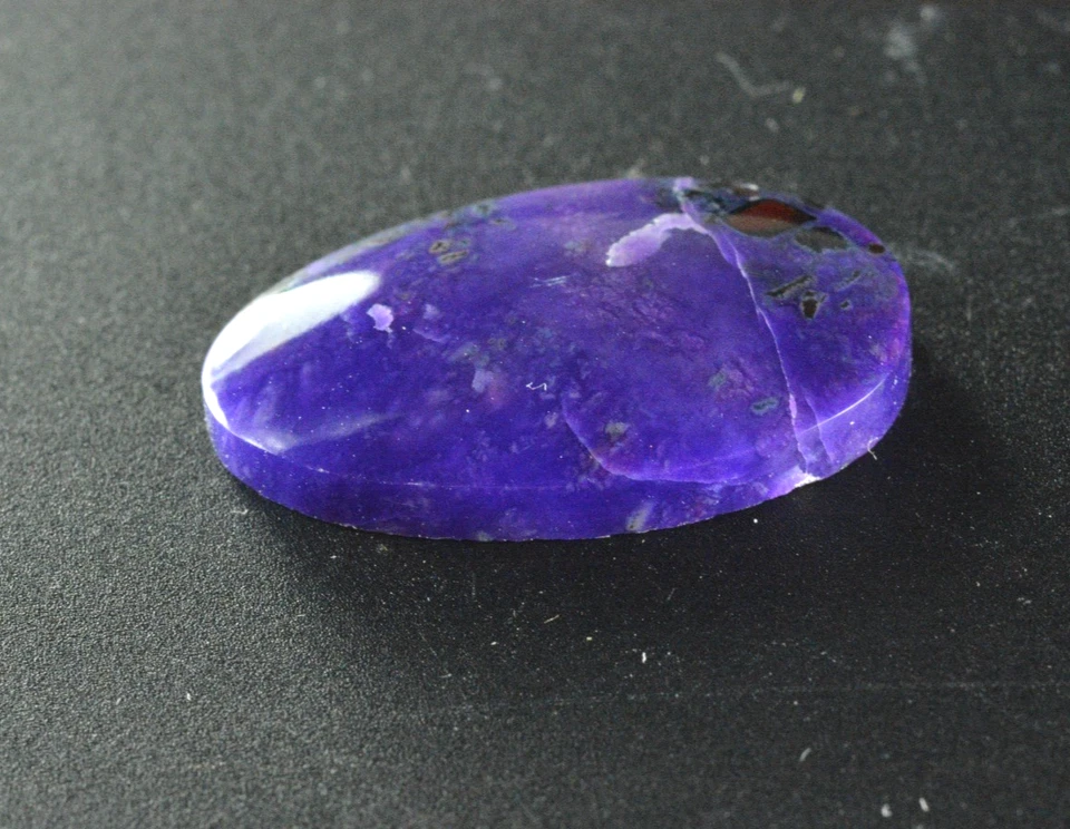 Cabujón Sugilite, cabina, mina Wessels, Sudáfrica, 15,54 CT Foto 2 de 3