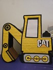 Piñata yellow cat excavator piñata caterpillar