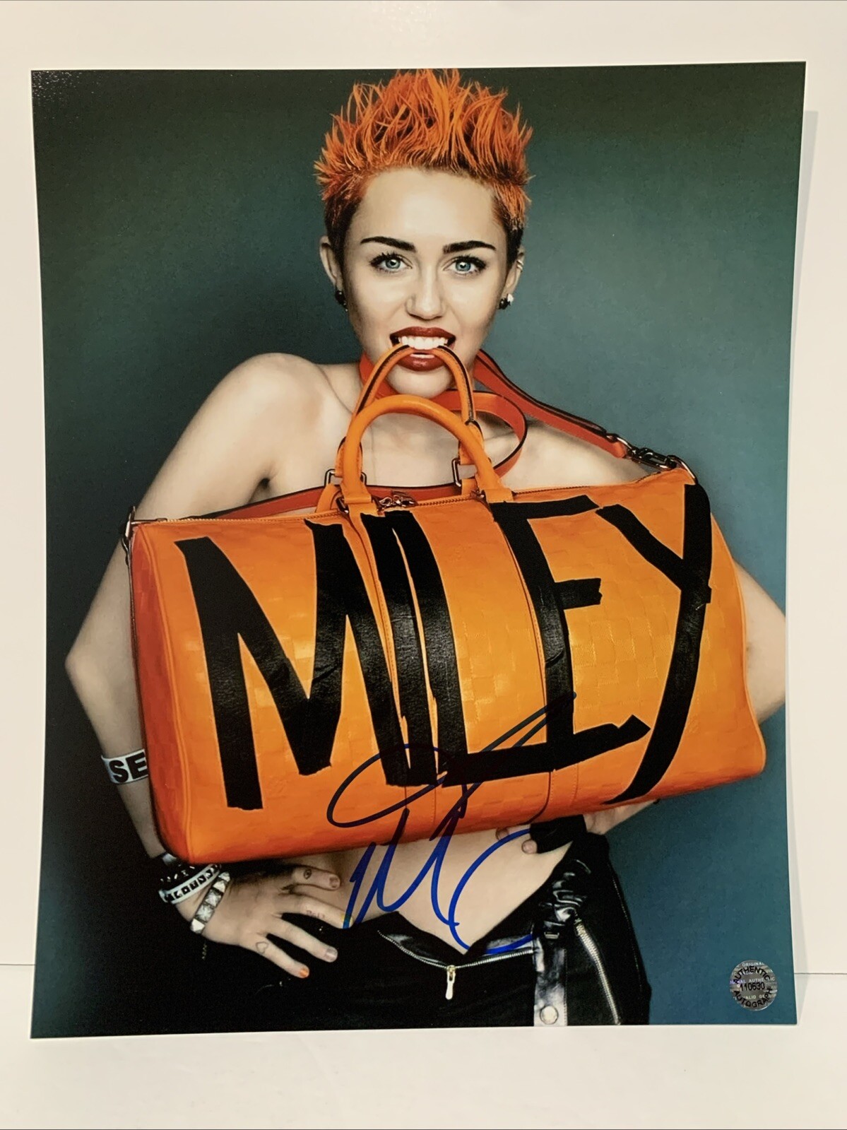 Miley Cyrus &lpar;Pop Artist&rpar; Signed Autographed 8x10 photo - AUTO with COA
