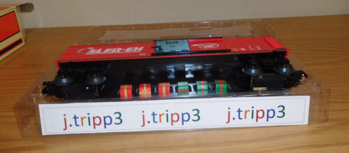 LIONEL 2128250 SLED-EX CHRISTMAS PRESENT UNLOADING CAR O GAUGE OPERATING TRAIN - Picture 3 of 5