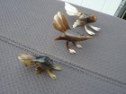 three organic shaped birds