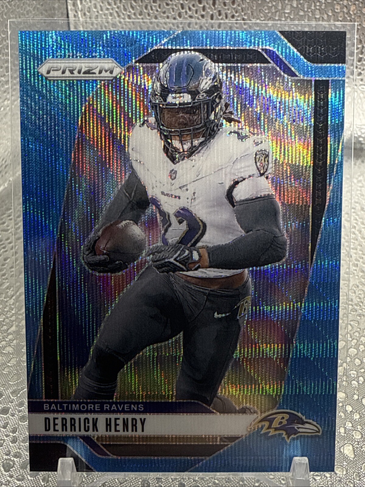 2024 Panini Prizm Derrick Henry Blue Wave Prizm /230 Baltimore Ravens