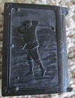 VINTAGE BAKELITE VESTA CASE WITH GOLFER ON ONE SIDE  CRICKET ON OTHER CIRCA1910