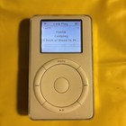 New ListingApple iPod M8541 White 1st Gen 10Gb Scroll Wheel 2002 Mp3 Player Emc 1910