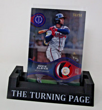 Ozzie Albies 2025 Topps Tribute Stamp of Approval #SOA-OA Purple 50/50 Relic