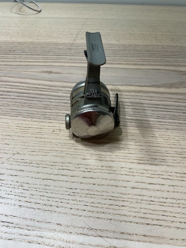 Carrete de pesca vintage Zebco UL4 clásico debajo del gatillo giratorio fundición giratoria EE. UU. - Imagen 8 de 17
