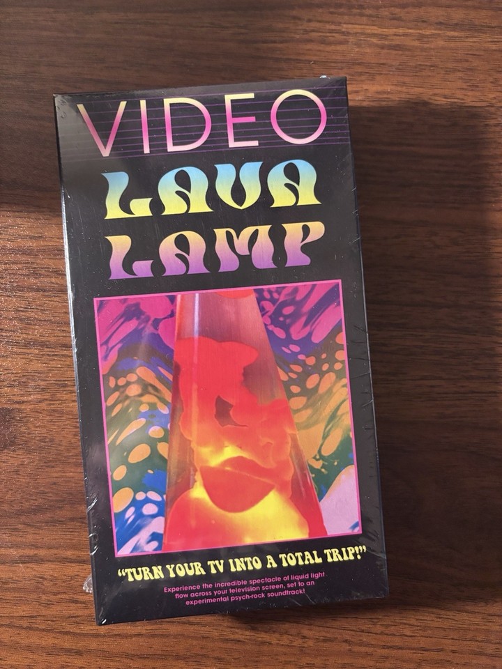 A VHS tape of experimental liquid light / lava lamp visuals — weird, cult, and totally analog in the best way.
