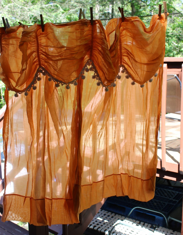 Vintage Orange Curtains with White Pom Poms 
