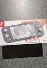 Nintendo Switch Lite Grey In Box, Comes With Charger, Good Condition, Odd Mark