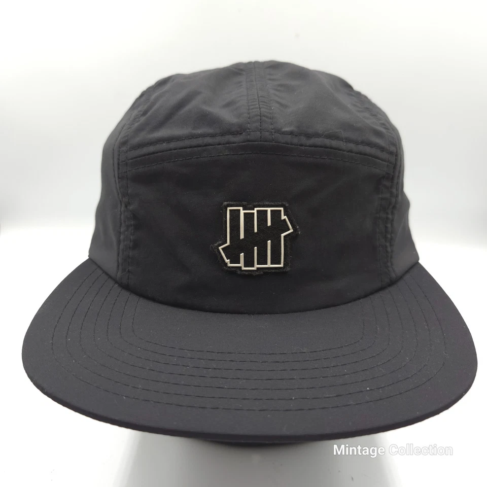 Gorra Undefeated Headwear Logo Parche Negro 5 Paneles 100% Nylon Correa Foto 2 de 4