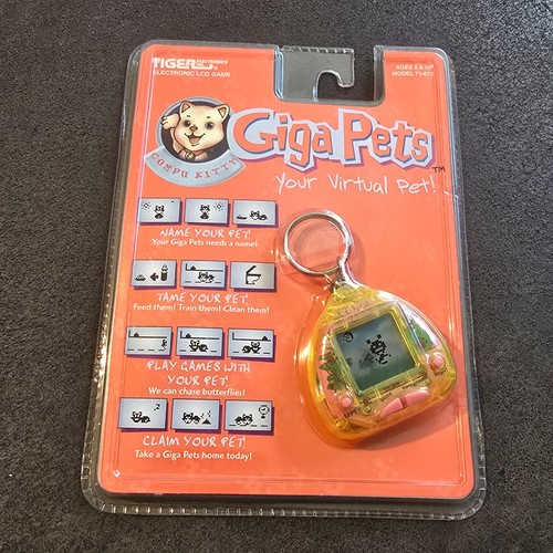 Giga Pets Compu Kitty Virtual Pet di Tiger Electronics 1997 vintage - nuovo sigillato - Foto 1 di 15