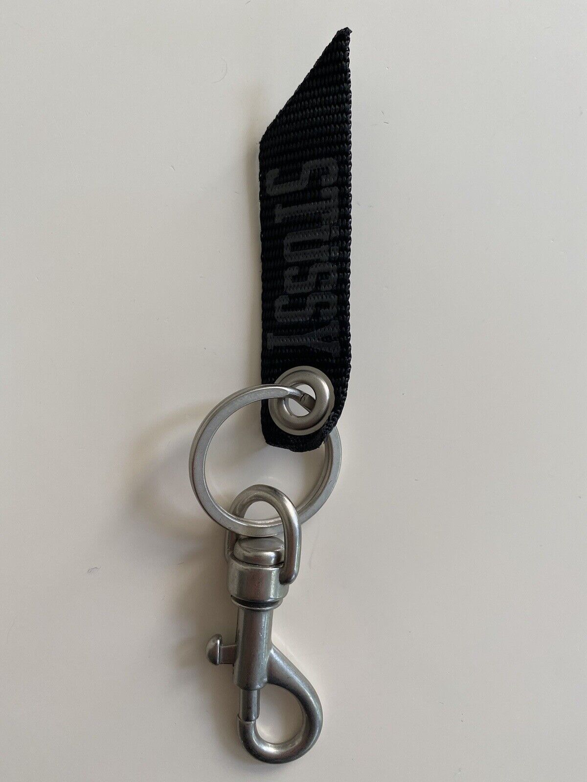 最大10%OFFクーポン STUSSY SURFMAN KEYCHAIN general-bond.co.jp
