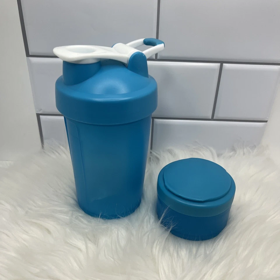 Botella agitadora suplemento proteico 450 ml + bandeja para pastillas y taza de dos compartimentos Foto 4 de 4