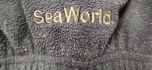 Shamu SeaWorld Herren 1/4 Zip Fleece Pullover Jacke Navy XL Tail Logo - Bild 6 von 6