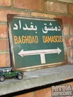 Baghdad Road Sign Gulf War  Sign Rusty Weathered Worn Iraq Saddam Hussein
