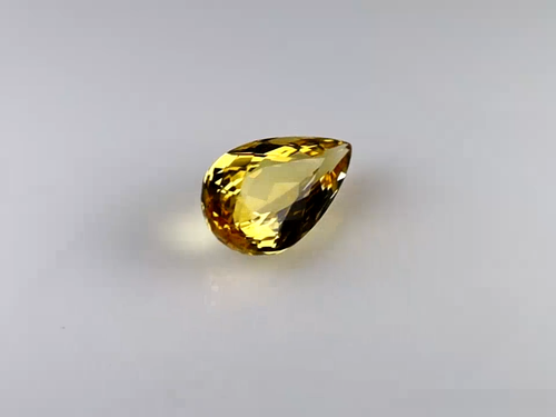 3.38 ct AIG Certified Pear Cut (13 x 7 mm) Orange Yellow Imperial Topaz Stone - Video 1 of 1