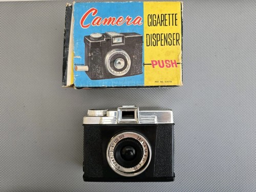 Vintage cigarette dispenser - camera dispenser